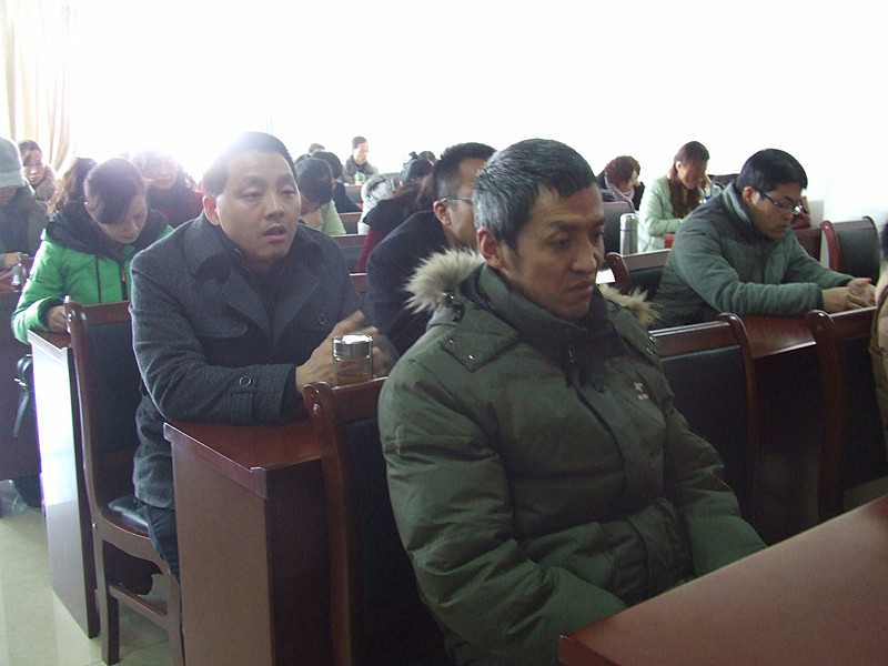 球盟会召开2014年度教职工大会